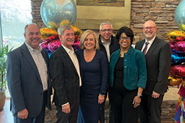 Mike and Debbie Quillen with others. Links to their story